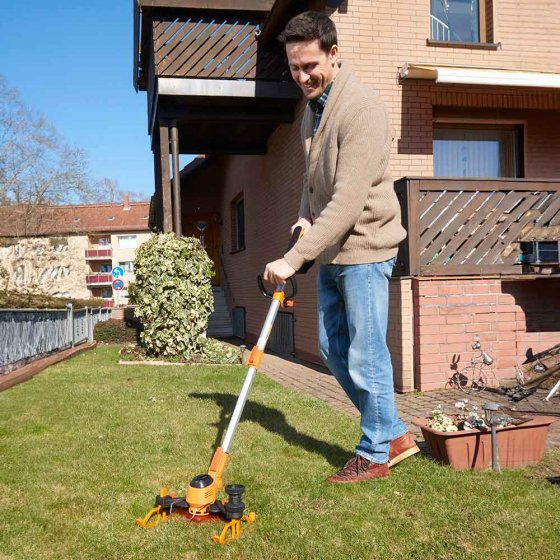 Coupe-gazon sans fil avec patins de guidage